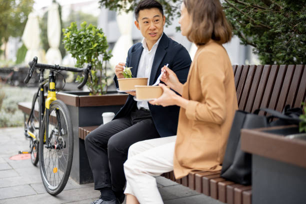 istock Business people having lunch at work in city 1351079684