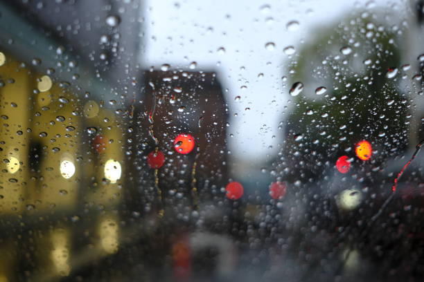 istock Drive car under the rain 1351080029