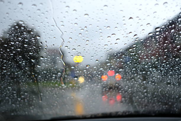 istock Drive car under the rain 1351080650