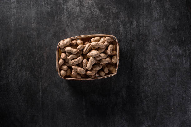 istock Top view photo of dried peanuts 1351081457