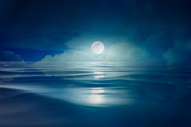 istock full moon in the sea at night 1351084549