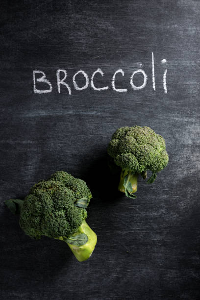 istock Picture of broccoli over dark chalkboard background. 1351084722