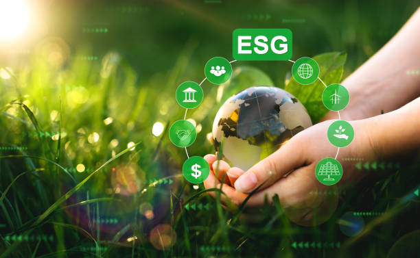 environment social and 
governance in sustainable and ethical business. hands holding crystal globe with  esg icons. using technology of renewable resource to reduce pollution. - esg stockfoto's en -beelden