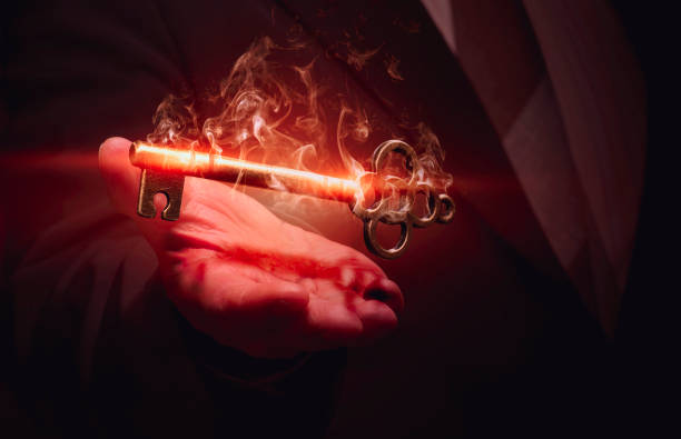 istock A businessman holding a shining key. Successful business idea. 1351087924
