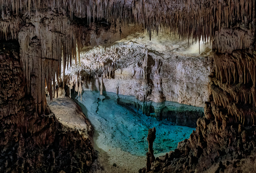 A cave or cavern is a natural void in the ground, specifically a space large enough for a human to enter. Caves often form by the weathering of rock and often extend deep underground.