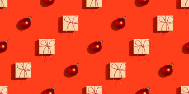 istock New Year's pattern of gift boxes and Christmas ornaments. 1351092608