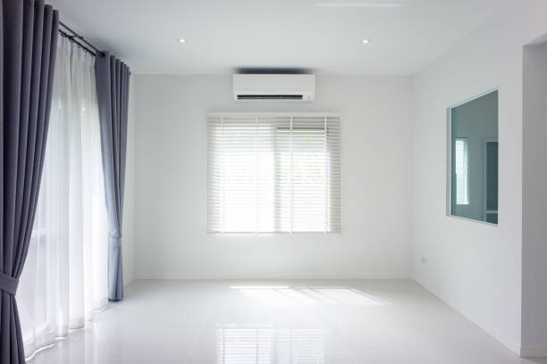 istock White empty room and tile floor in perspective view for background. 1351093841