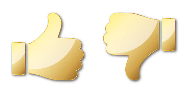 istock Thumb up and down. Gold hand icon. Gold symbol of like and dislike 1351094119