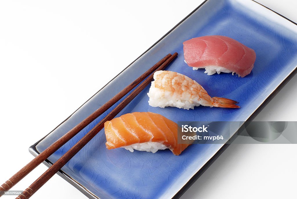sushi sushi and chopsticks Cooked Stock Photo