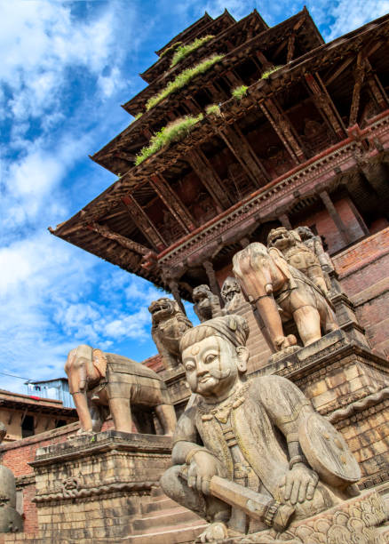 istock Stone statues on the steps of temple 1351100325