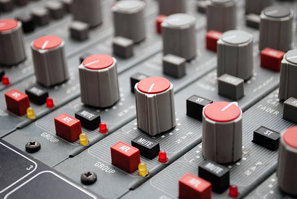 istock sound mixer console with highlighted button, pump the volume 135110036