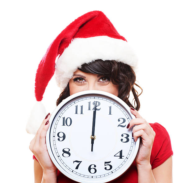 istock santa girl with clock 135110037