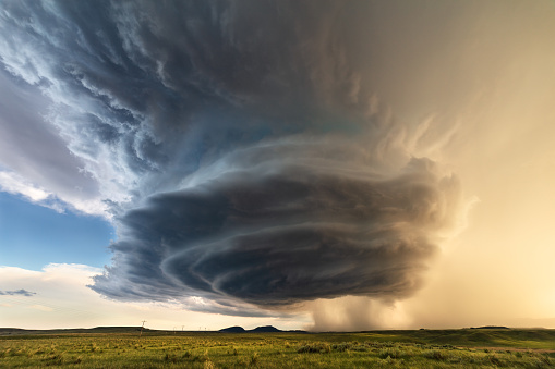 Supercell thunderstorm with dramatic storm clouds and sky during a severe weather event in Malta, Montana.