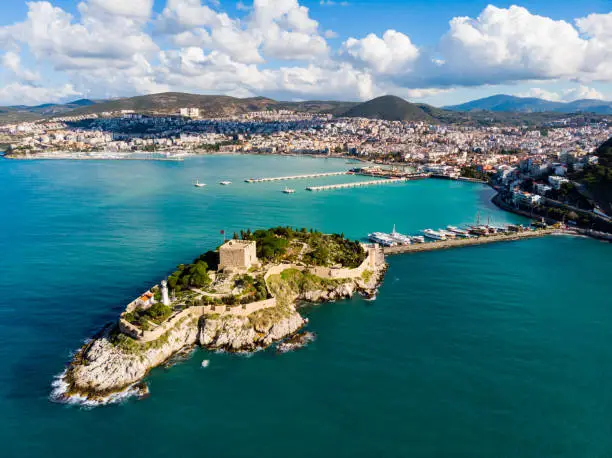 View from drone of Pigeon Island with medieval fort on Turkey's Aegean coast in Kusadasi