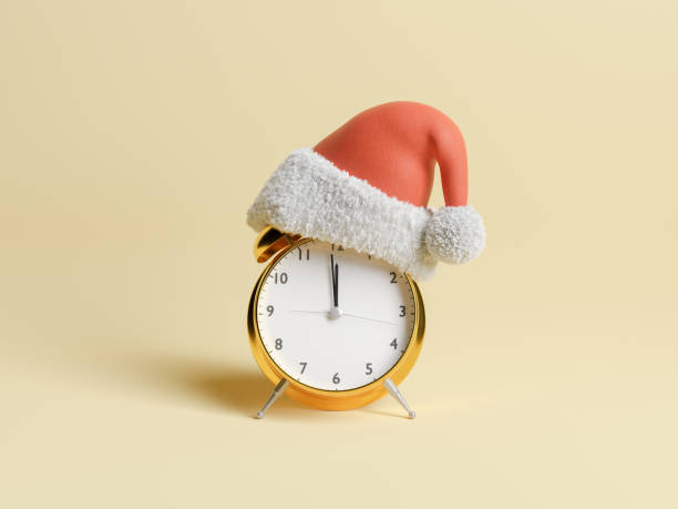 istock alarm clock with Santa Claus hat 1351107103