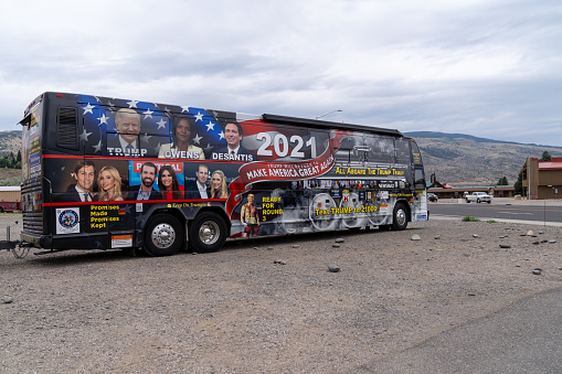 Cody, Wyoming - July 5, 2021:  Donald Trump Train Make America Great Again bus parked in a parking lot for a Republican Party Trump Rally