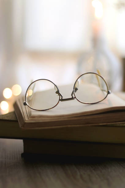 istock Books, Glasses and Candles 1351111525