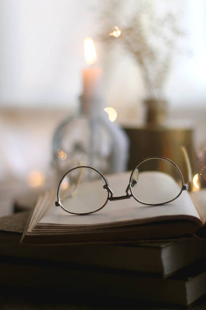 istock Books, Glasses and Candles 1351111526