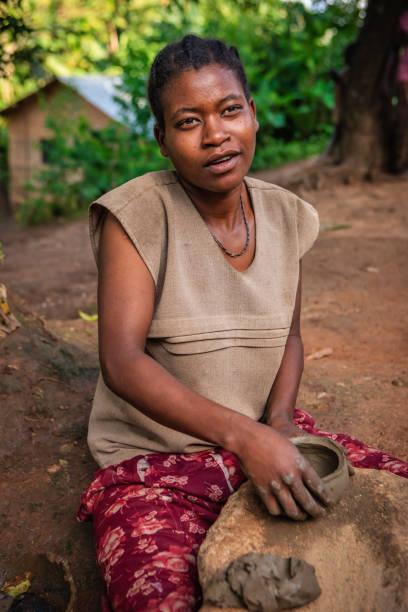 istock Young Ethiopian woman making pottery 1351111841