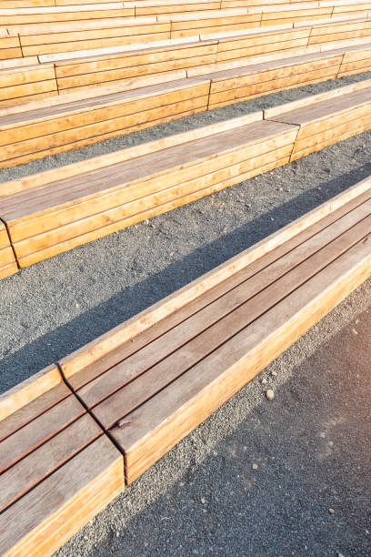 istock amphitheater bench wooden geometric diagonal lines pattern stairs 1351114427