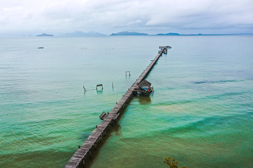 Koh Mak tropical island and its long wooden pier on the sea, near koh Chang, Trat, Thailand, south east Asia