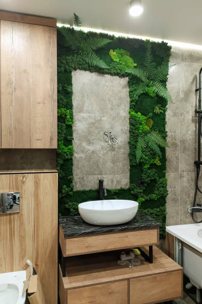 istock Decorative green stabilized moss in the bathroom. Bathroom decor. Interior design 1351119389