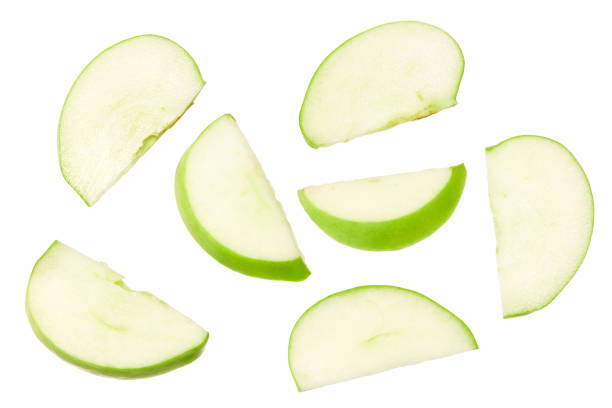 istock green apple with slices isolated on a white background. top view. clipping path 1351119481
