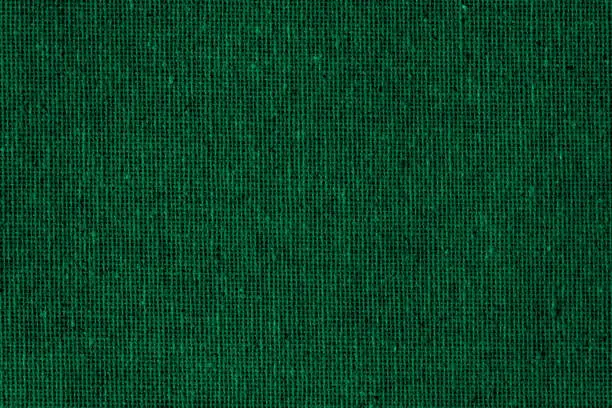 Photo of Green Dark Background Burlap Sack Jute Linen Woven Fabric Grid Pattern Grid Deep Teal Christmas Texture Copy Space Macro Photography