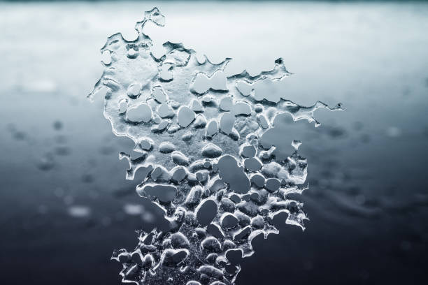 istock Abstract Sheet of Ice with Holes 1351124497