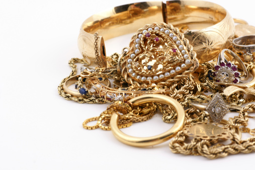 Close-up of 14k gold jewelry. Plenty of copy space. 