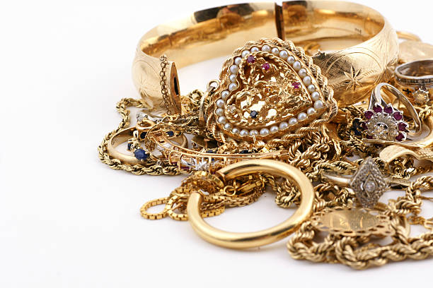 A messed up pile of gold jewelry stock photo