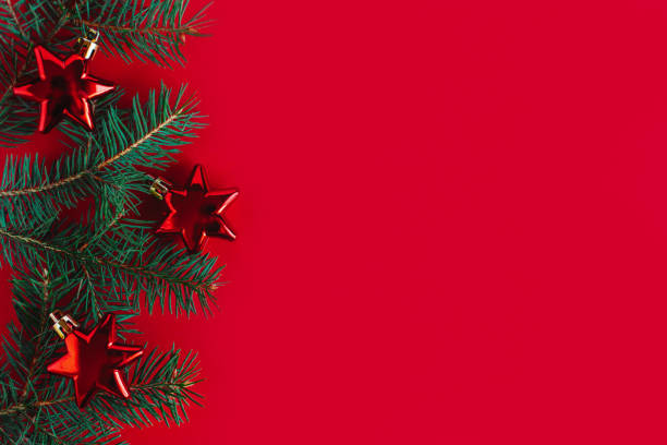 istock Christmas background with spruce branches and red ornaments. 1351126941