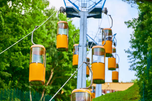 aerial lift for tourists, transport from mountain to sea beach - telpher imagens e fotografias de stock