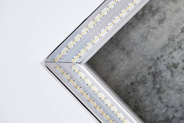 strip led light with square aluminum profile on stretch ceiling, close up. home renovation concept - wall profile imagens e fotografias de stock