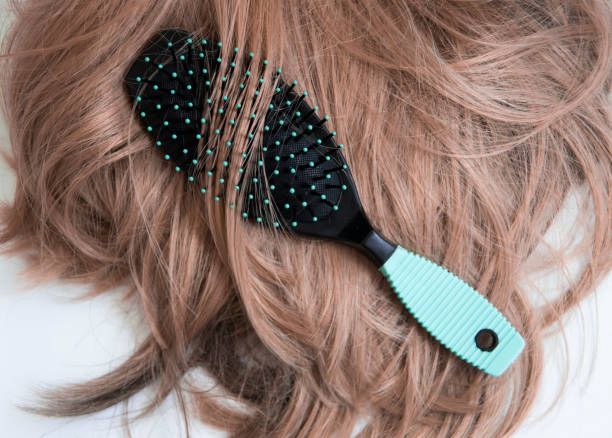 istock comb, beautiful hair close up 1351129400