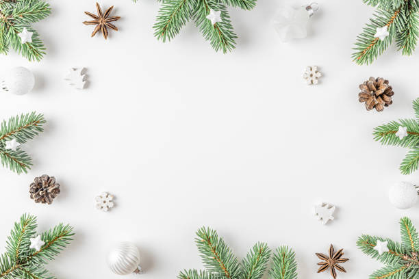 istock Christmas composition. Frame made of fir tree, gift boxes, decorations on white background. Flat lay. Top view 1351141172
