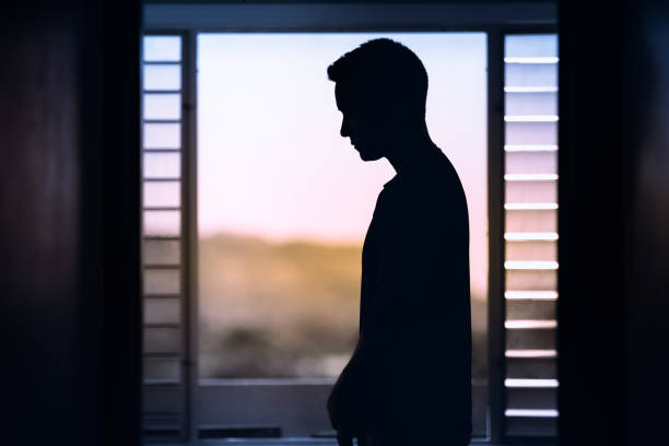 istock Sad young man at home. 1351146239