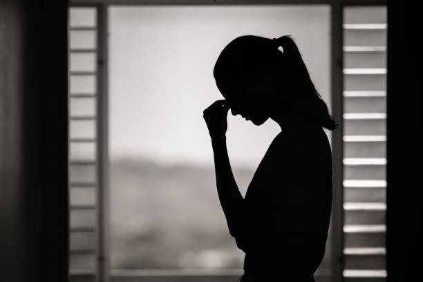 istock Sad woman at home 1351146254