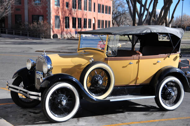 1928 Ford Model T, Alamosa, Colorado, USA Alamosa, San Luis Valley, CO, USA: Ford Model T, a late model from 1928, touring version, parked near Adams University.  Old convertible with spare wheel. model t ford stock pictures, royalty-free photos & images