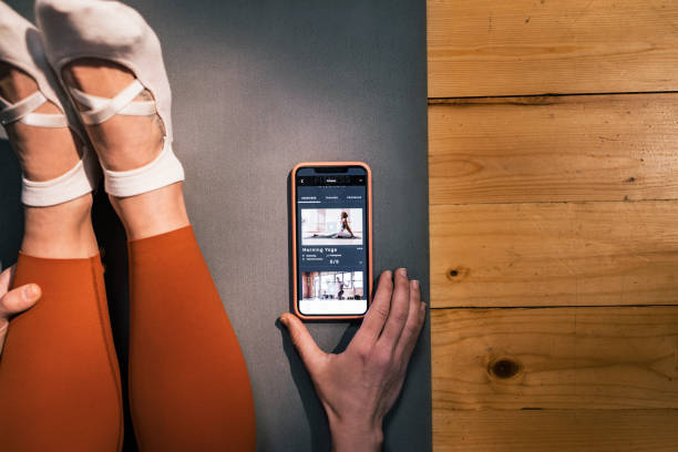istock An Anonymous Woman Watching Training Videos on her Smartphone 1351147670