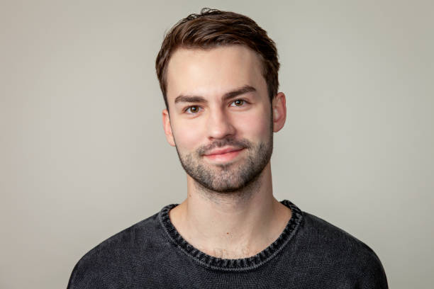 istock Studio portrait of attractive 20 year old bearded man 1351147761