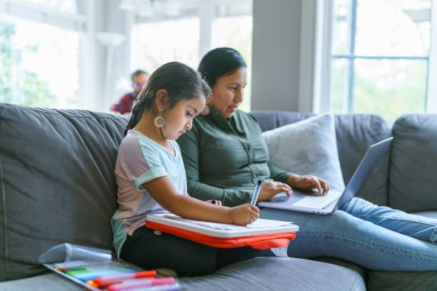 native american family relaxing at home - native american north american tribal culture women mature adult imagens e fotografias de stock