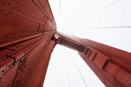 Beneath a giant pillar of the Golden Gate Bridge, San Francisco, USA