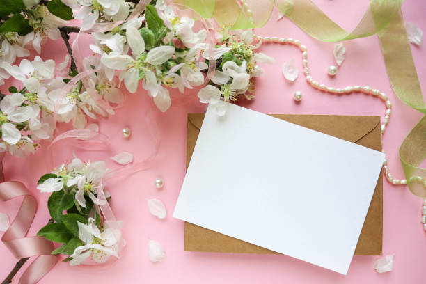 istock Frame from flowering spring branches and white blank for the text. congratulation. invitation 1351154475
