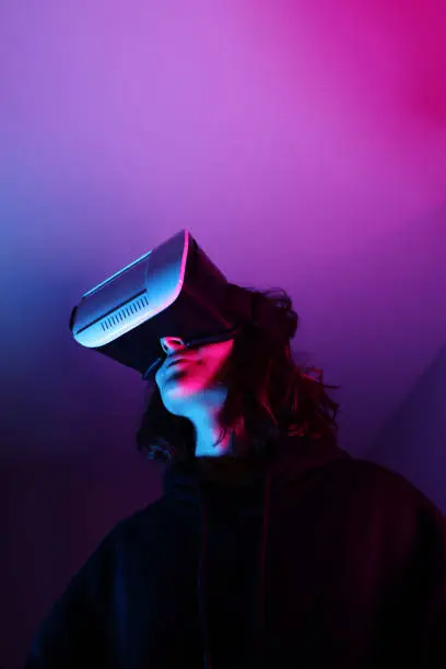 Photo of Woman wearing VR Glasses s