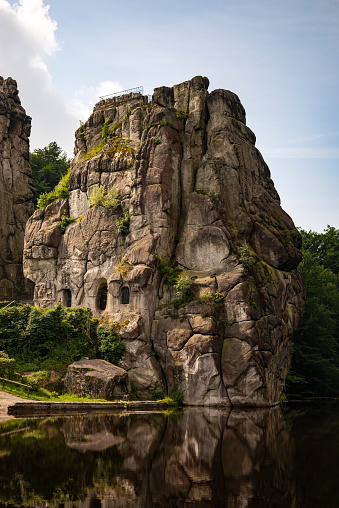 The Externsteine, a prominent sandstone rock formation in the Teutoburg Forest, near the town of Horn-Bad Meinberg in the district of Lippe in North Rhine-Westphalia (Germany). The Externsteine are an outstanding natural sight in Germany, protected as a natural and cultural monument of historical significance.