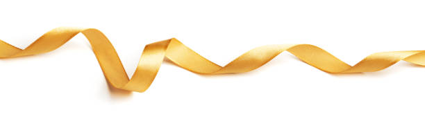 istock Wavy golden ribbon isolated on white background. 1351155160