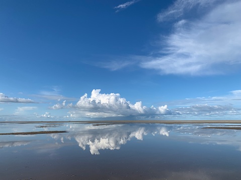 Storm cloud panorama over the beach at Texel island in the waddensea region during an autumn day.