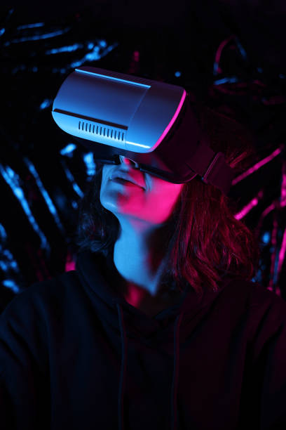 istock Woman wearing VR Glasses s 1351156692