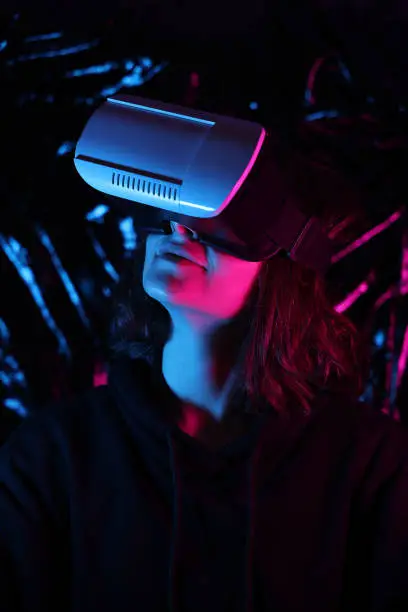 Photo of Woman wearing VR Glasses s